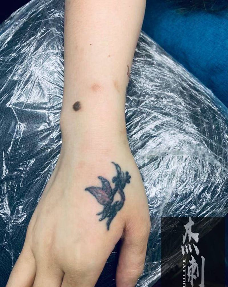 素花遮盖纹身图片_手臂纹身图案