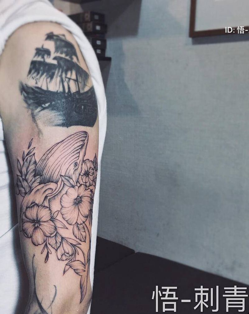 素花鲸鱼纹身图片_手臂点刺纹身图案