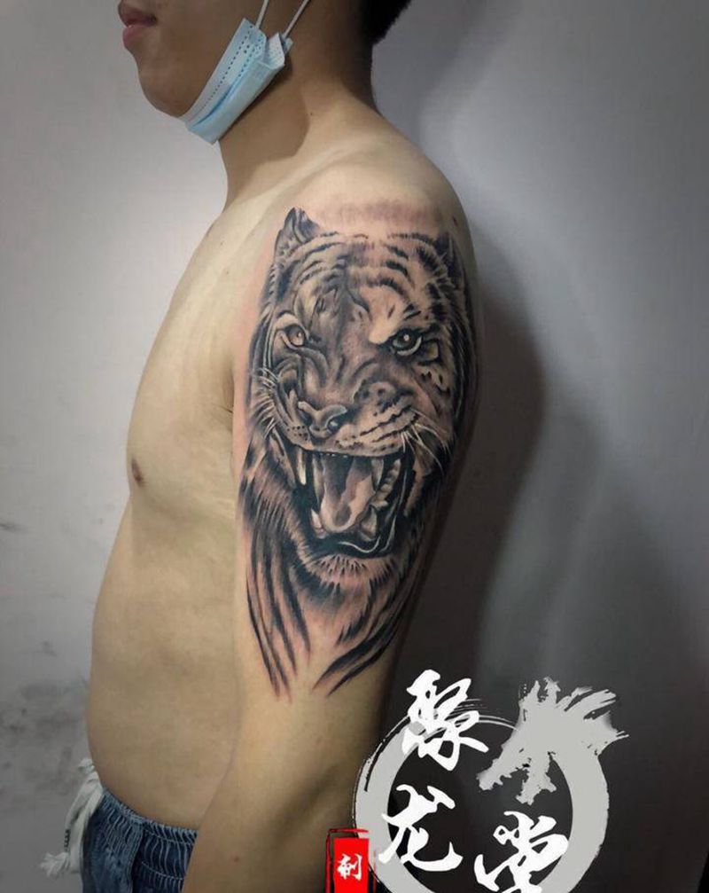 虎头纹身图片_手臂纹身图案