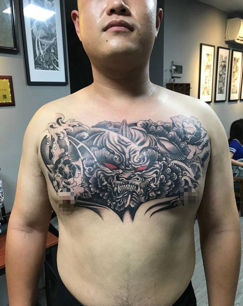 唐狮纹身图片_胸部新传统纹身图案