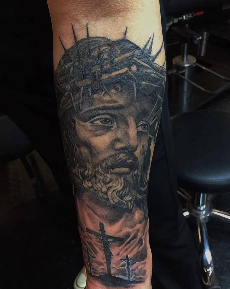 耶稣纹身图片_手臂纹身图案