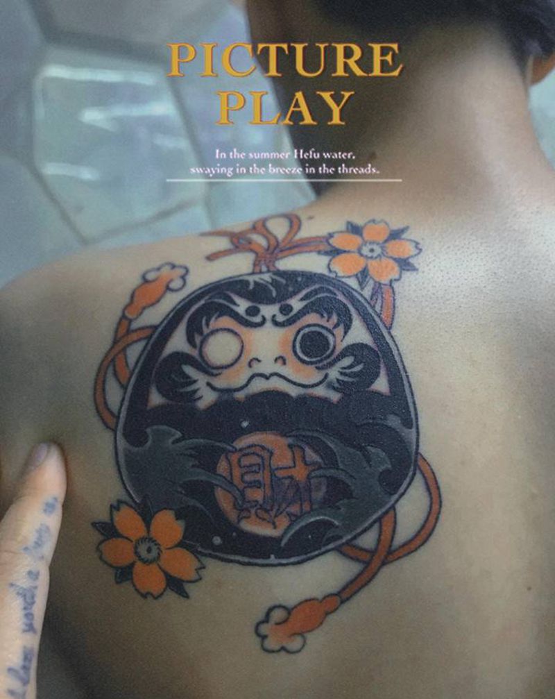 达摩蛋纹身图片_肩部背部新传统纹身图案