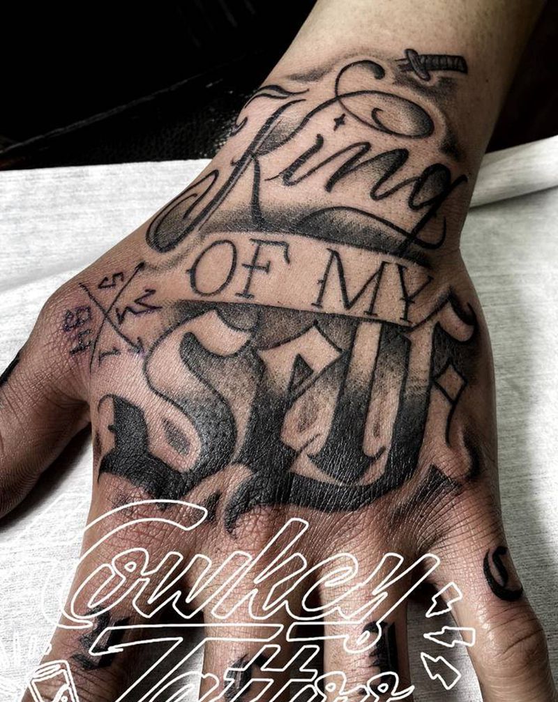 爆手背纹身图片_手部花体字点刺纹身图案