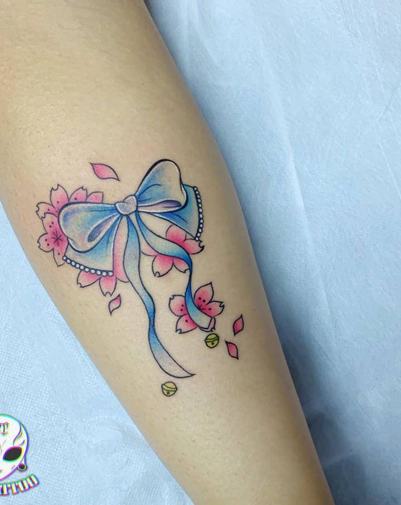 蝴蝶结纹身图片_腿部水彩纹身图案
