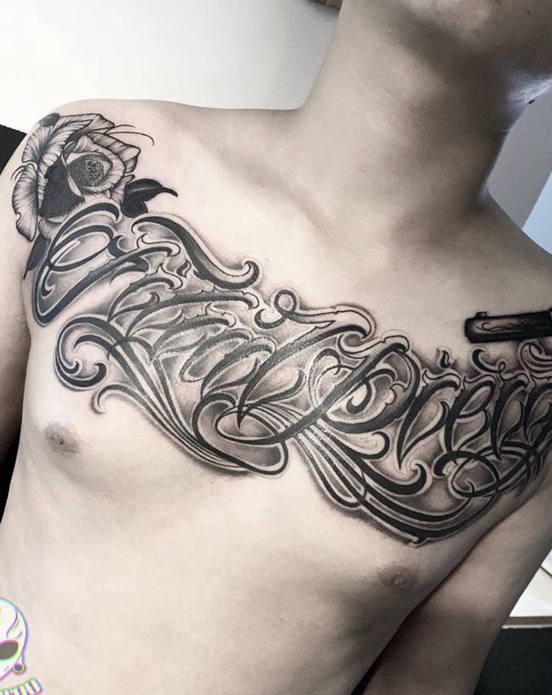 花体花胸纹身图片_胸部花体字纹身图案