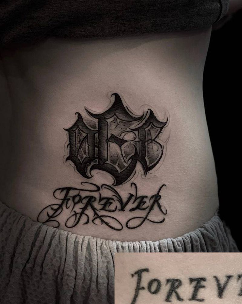 修改  /新增DEE纹身图片_腰部花体字纹身图案