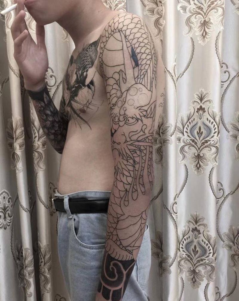 花臂龙未完成纹身图片_手臂老传统龙纹身图案