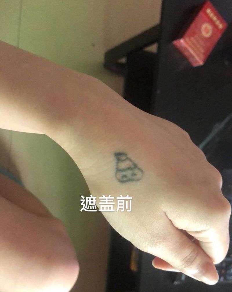 手背遮盖一则纹身图片_手部手臂纹身图案