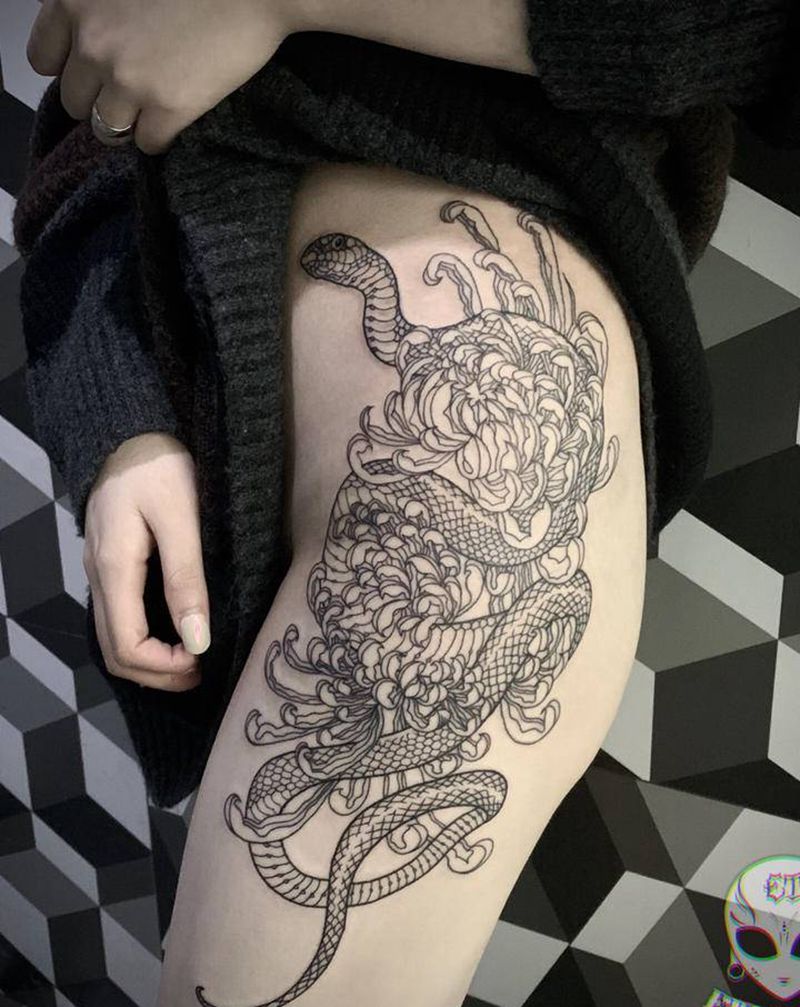 一则蛇和菊花纹身图片_腿部脚部纹身图案