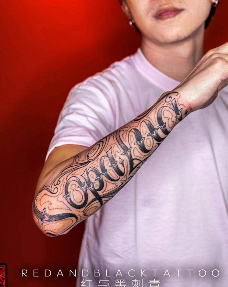花体字纹身图片_手臂花体字纹身图案