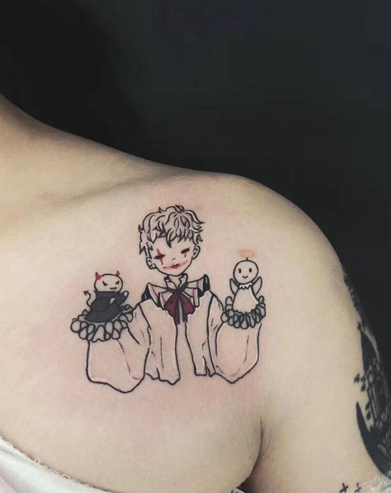 小丑娃纹身图片_胸部纹身图案