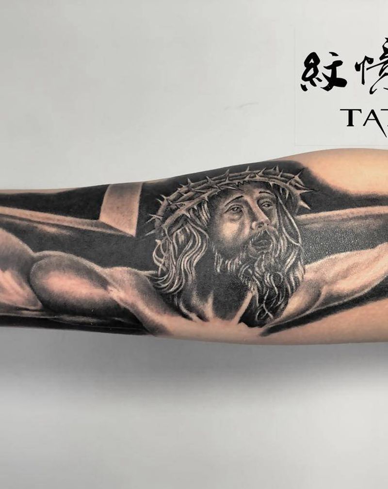耶稣纹身图片_手臂欧美写实纹身图案