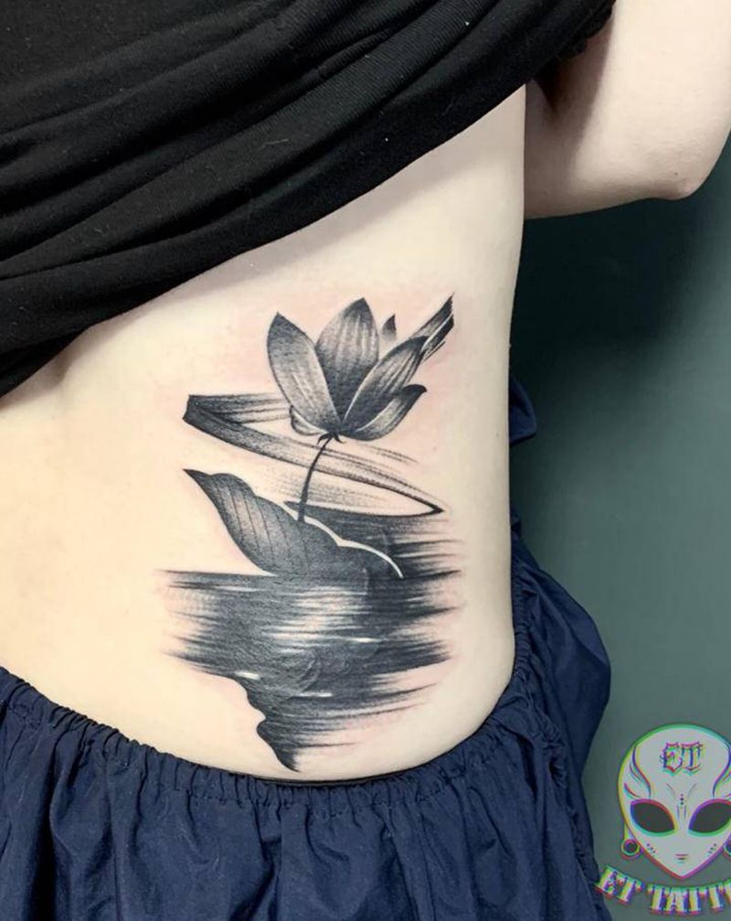 遮盖一则纹身图片_背部腰部水墨纹身图案