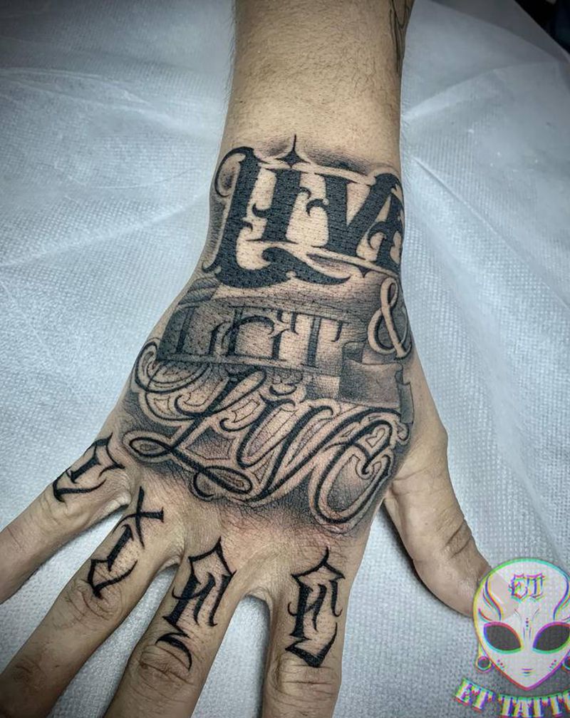 爆手背纹身图片_手臂手部花体字纹身图案