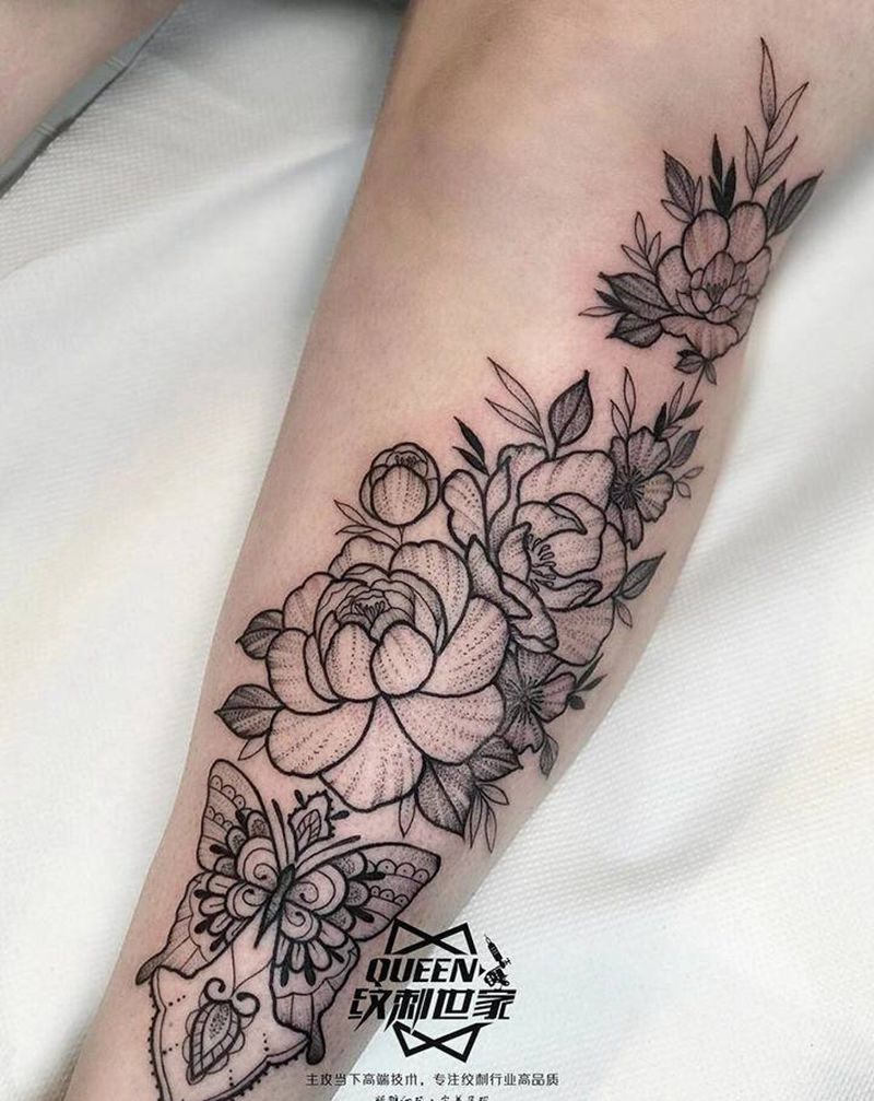 素花纹身图片_腿部纹身图案