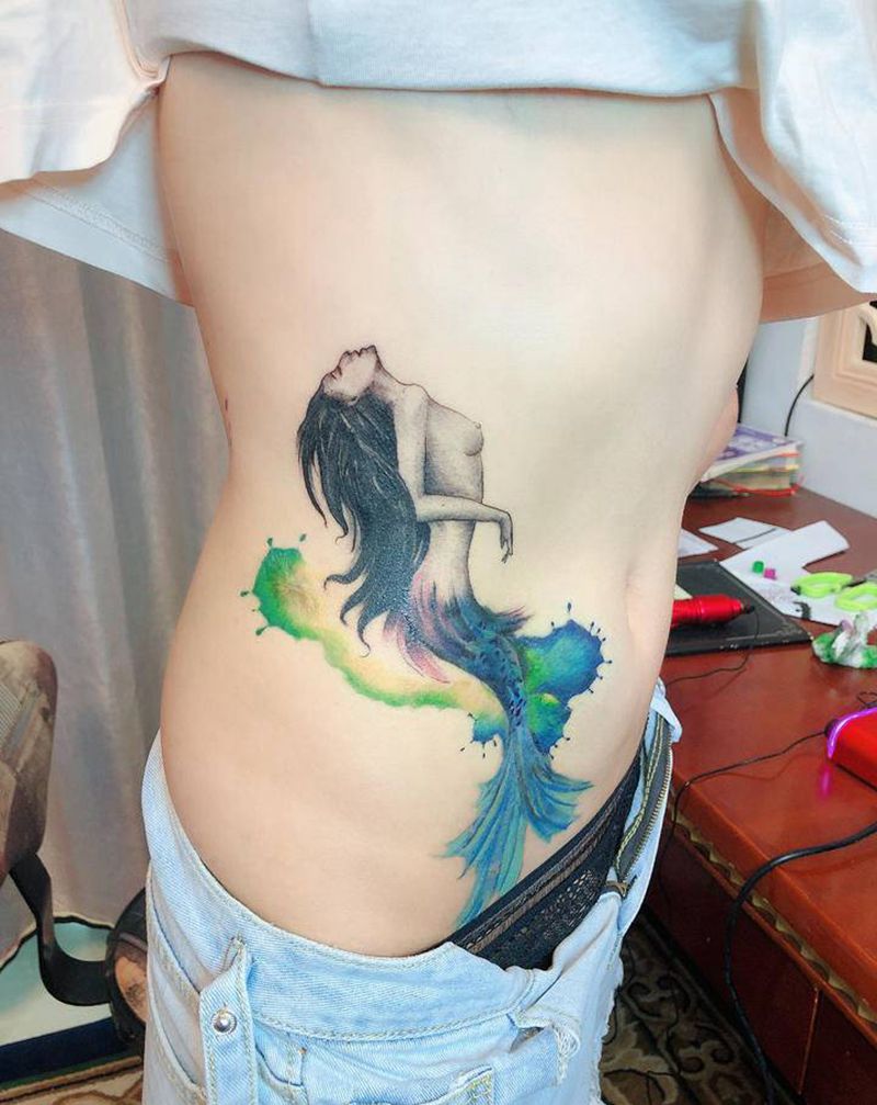 美人鱼这个阑尾炎伤疤。纹身图片_腰部纹身图案