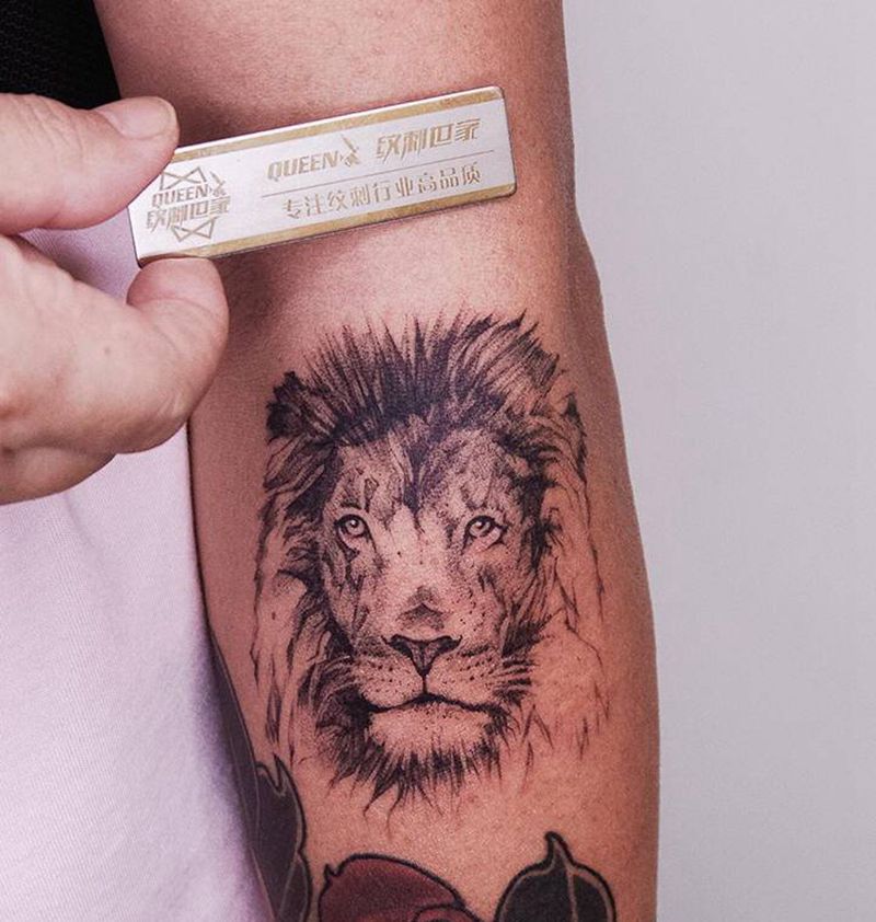 狮子～纹身图片_手臂纹身图案