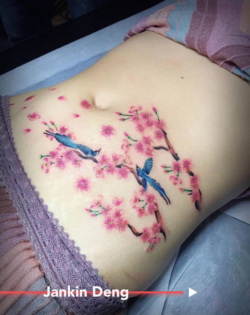 妊唇纹遮盖纹身图片_新传统水墨纹身图案