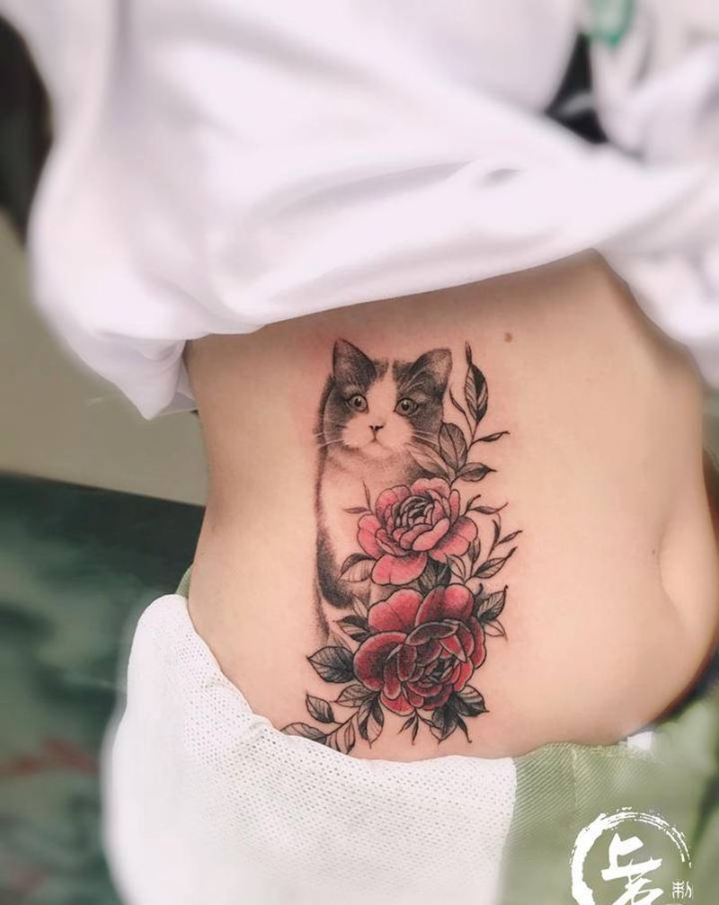 猫奴纹身图片_腹部点刺纹身图案