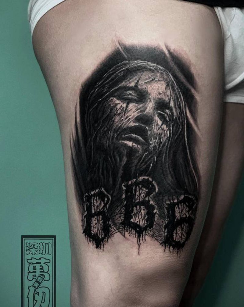 暗黑修女石像纹身图片_腿部纹身图案