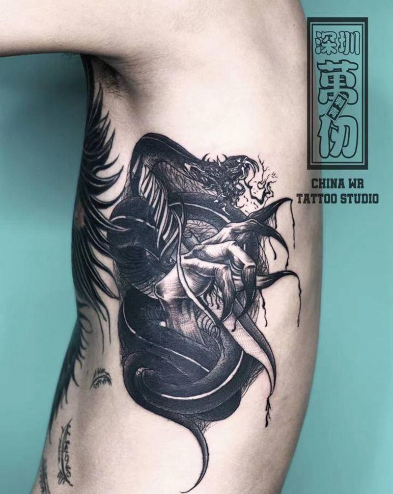 暗黑蛇刀手-遮盖纹身图片_腰部纹身图案