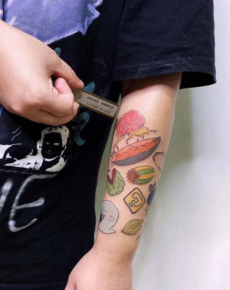 卡通纹身图片_手臂水彩纹身图案