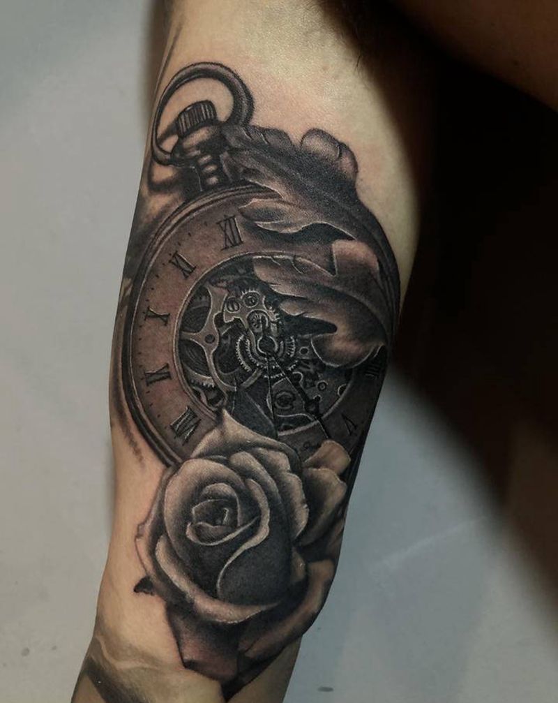 时钟 玫瑰纹身图片_手臂欧美写实纹身图案
