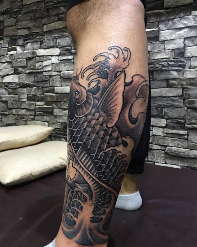 一条怪鱼纹身图片_手臂纹身图案