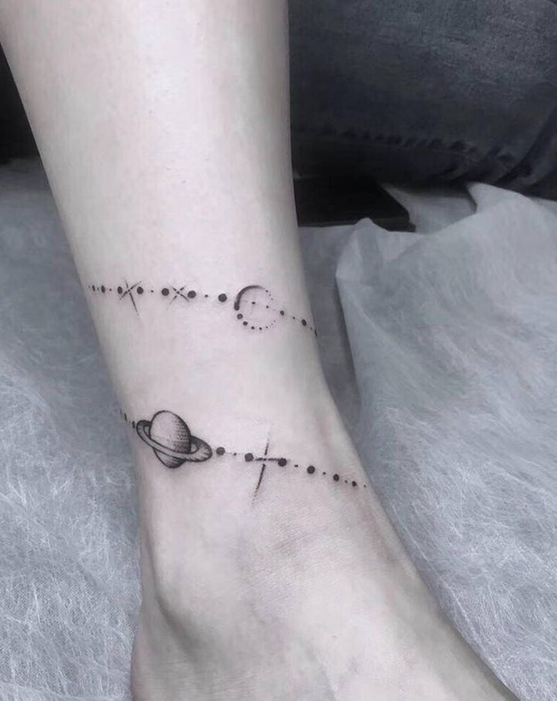 土星纹身图片_腿部纹身图案