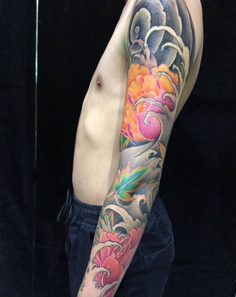 浪与牡丹纹身图片_手臂纹身图案