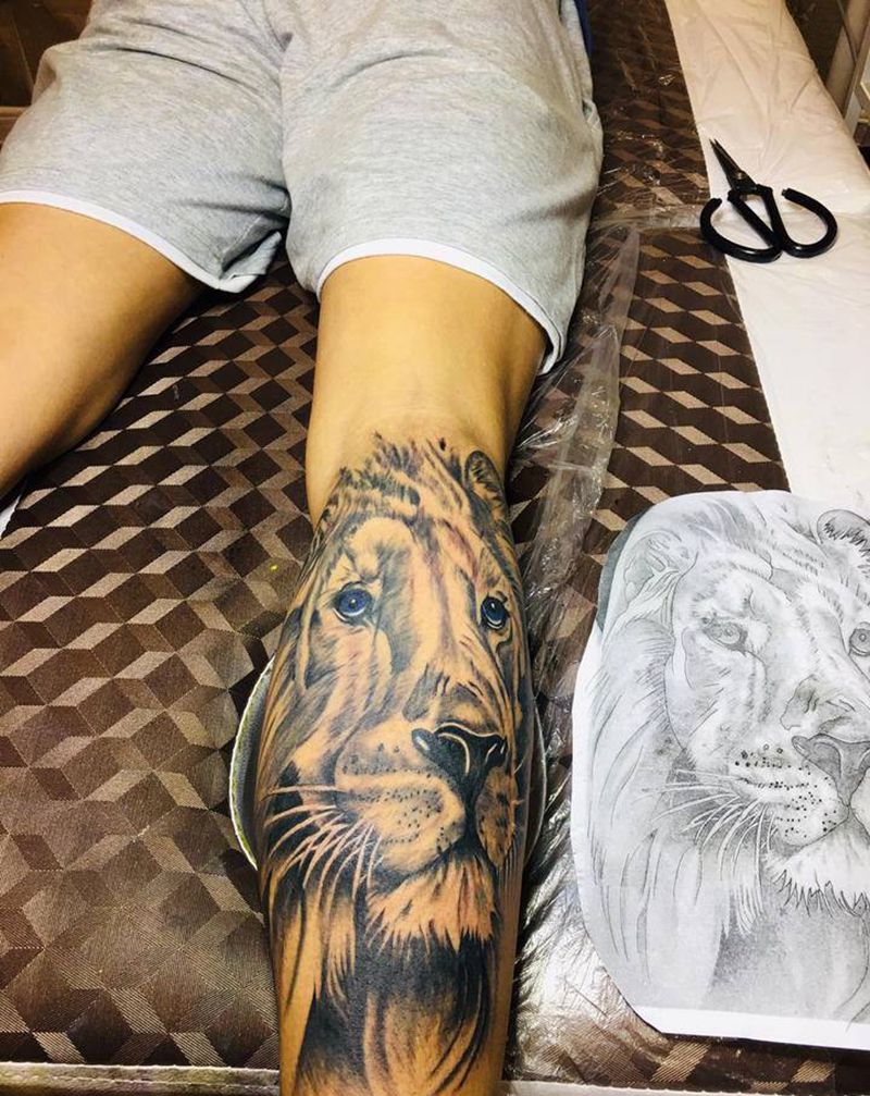 狮子纹身图片_腿部纹身图案