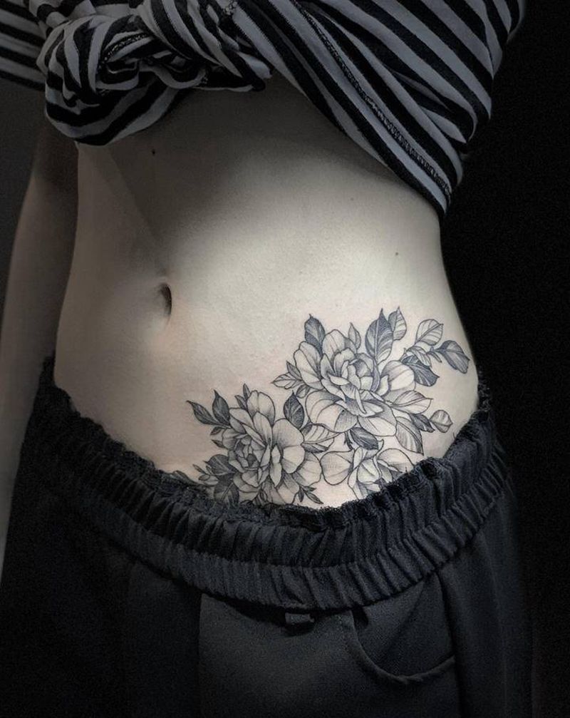 素花纹身图片_腰部点刺纹身图案