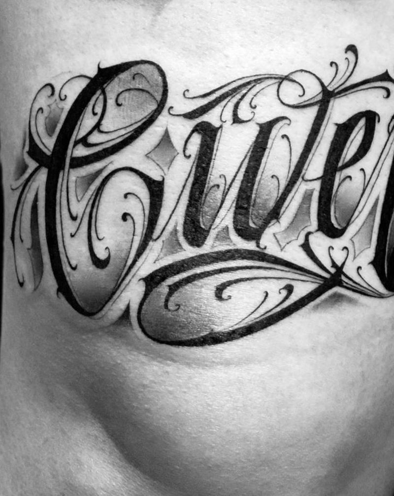 字纹身图片_腿部花体字纹身图案