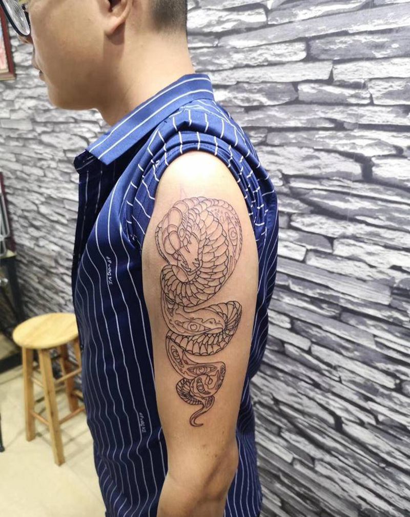 蛇线条纹身图片_手臂新传统纹身图案