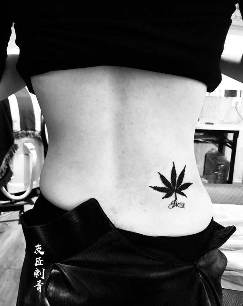 大麻叶纹身纹身图片_腰部新传统纹身图案