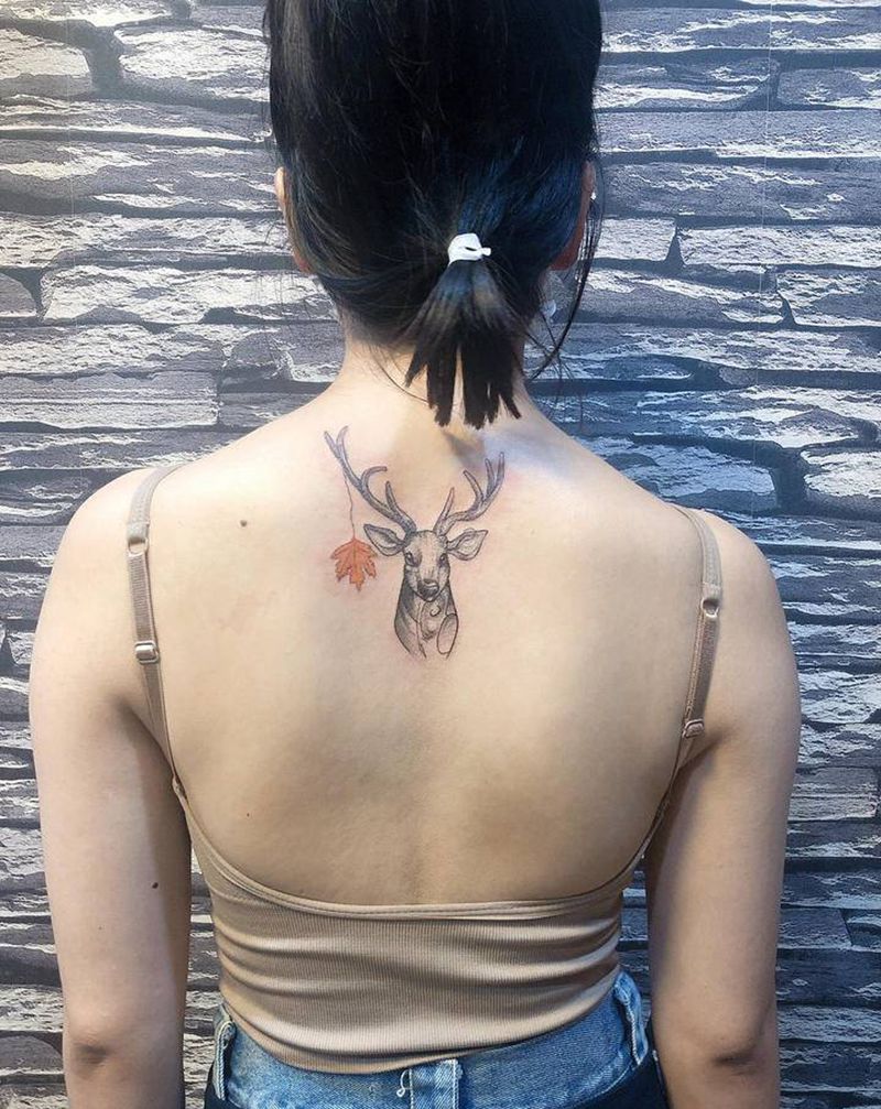 麋鹿首纹身图片_背部点刺纹身图案