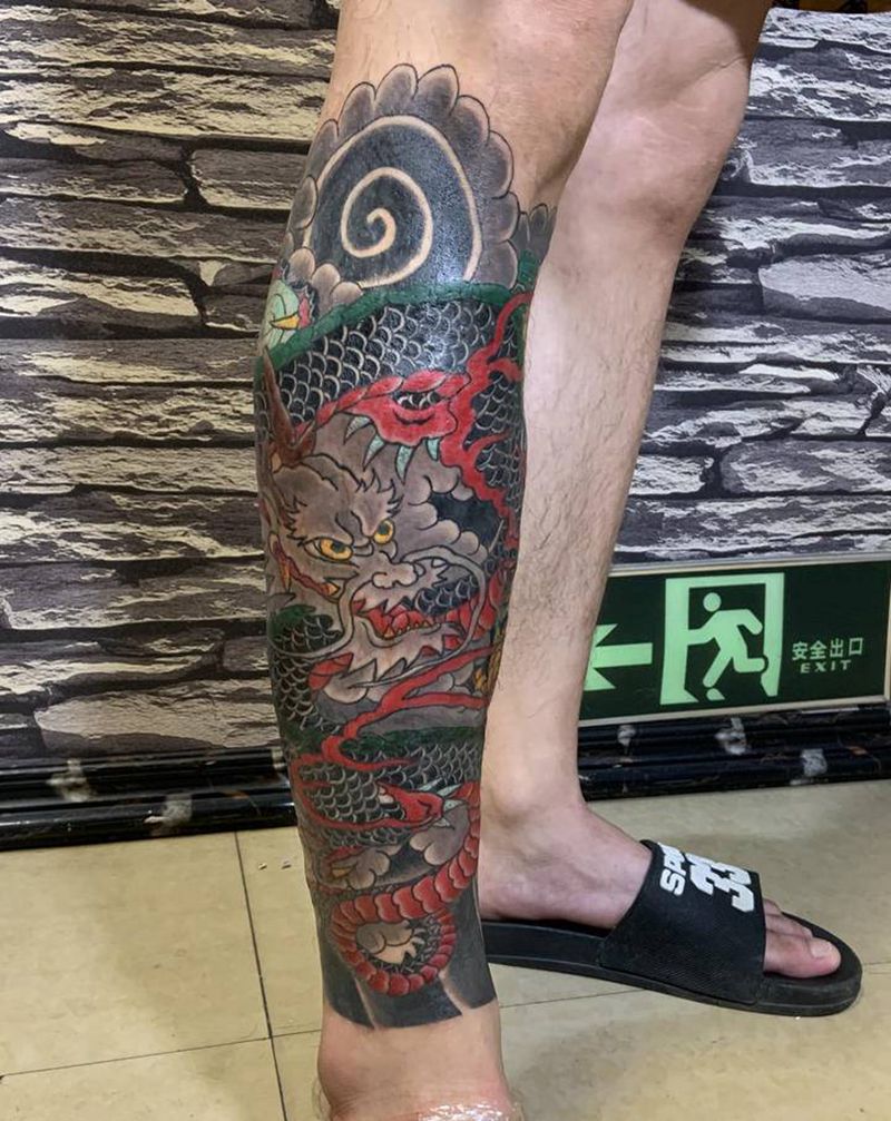 老传统龙包小腿纹身图片_腿部老传统纹身图案