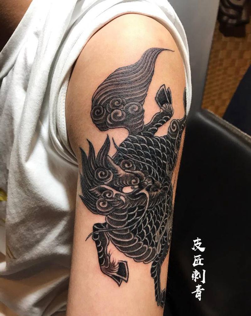 麒麟纹身纹身图片_手臂新传统纹身图案