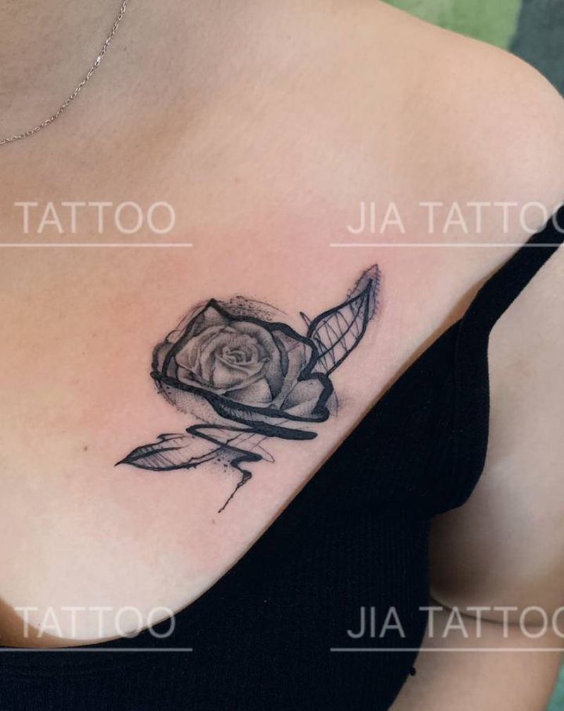 玫瑰花纹身图片_胸部点刺水墨纹身图案