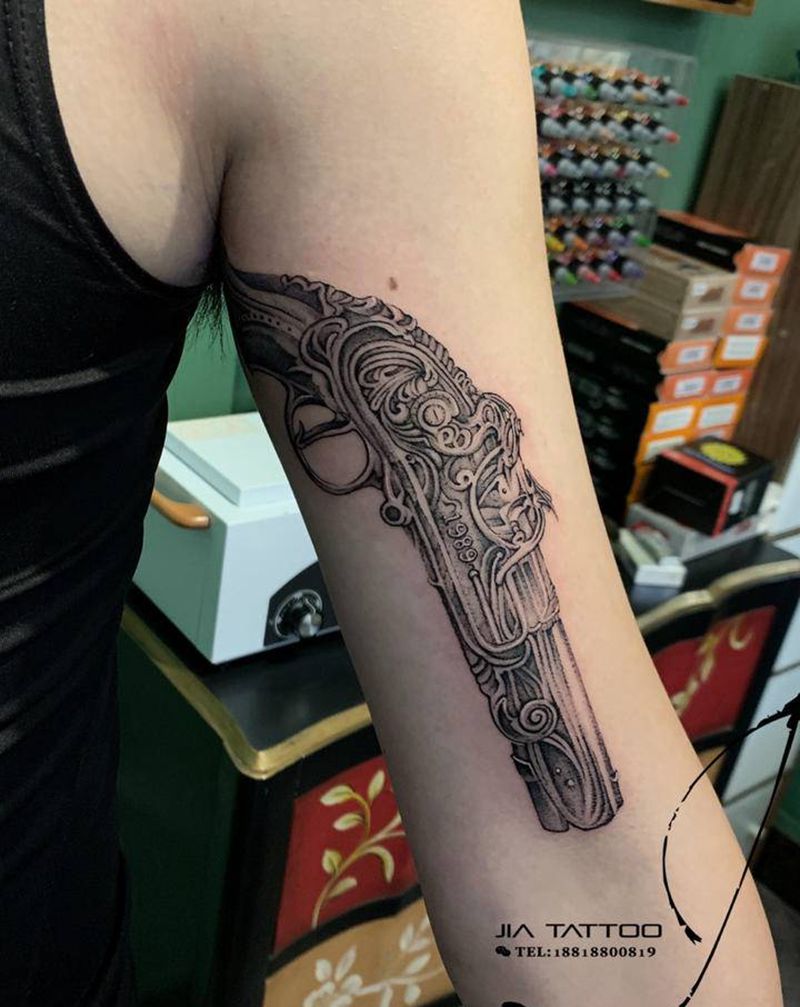 枪纹身图片_手臂手部欧美写实纹身图案