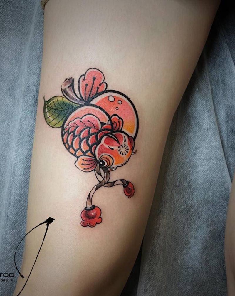 小金鱼纹身图片_腿部水彩纹身图案