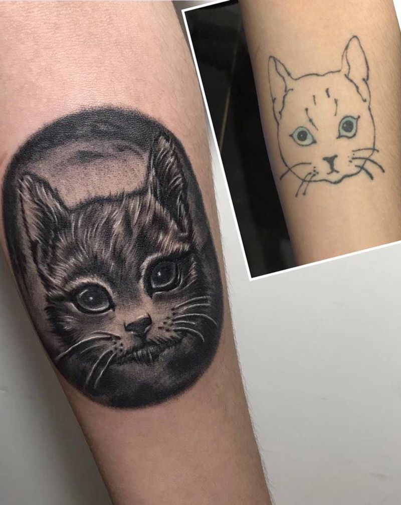 猫咪修改纹身图片_手臂欧美写实纹身图案