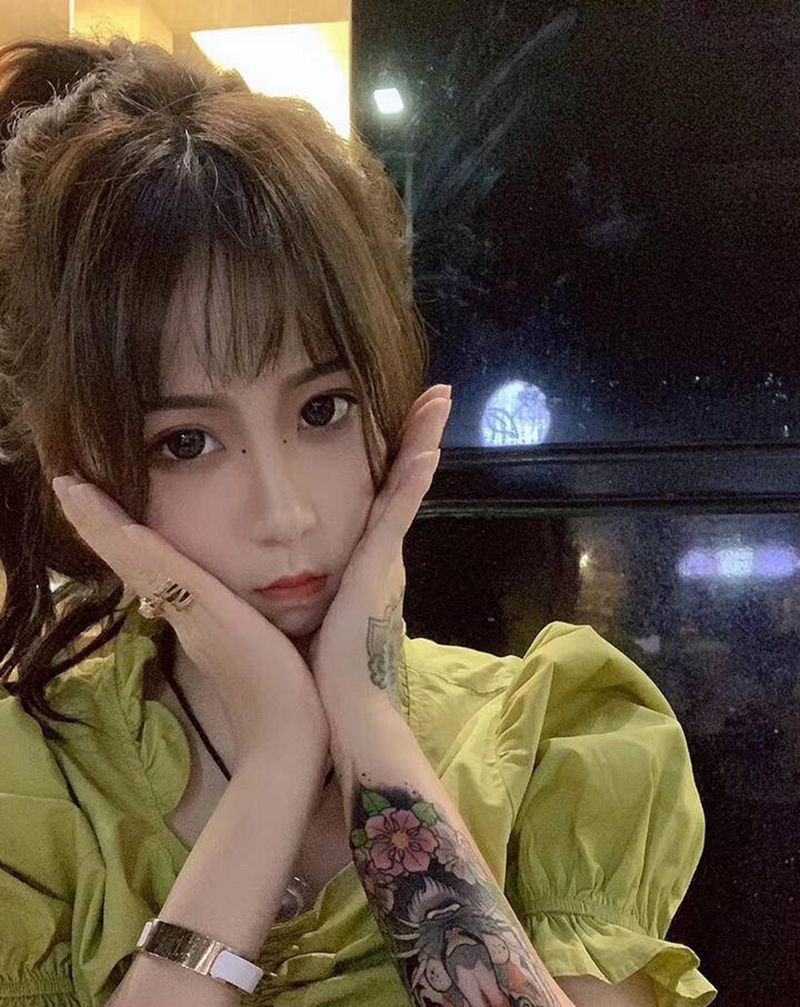 揭阳网红老虎妹纹身图片_手臂手部New School水彩纹身图案