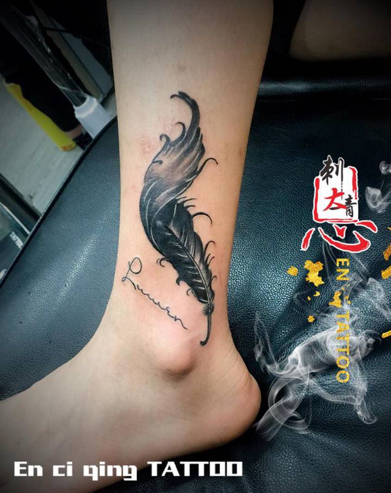 羽毛纹身图片_腿部纹身图案