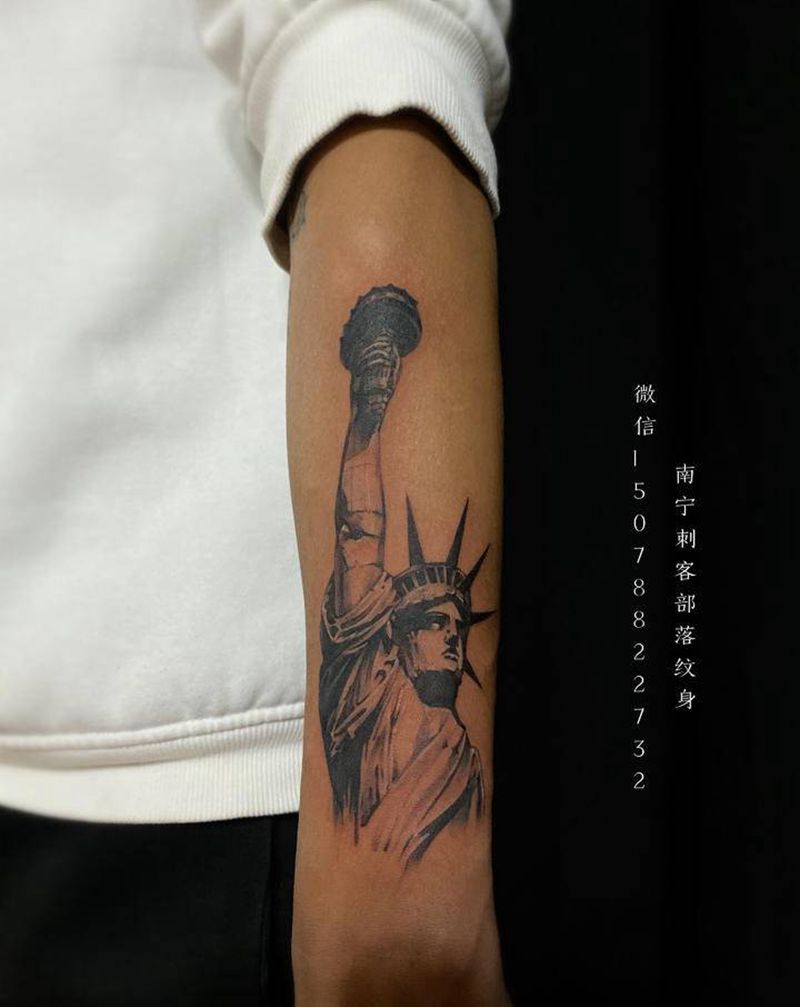 自由女神纹身图片_手臂新传统欧美写实纹身图案