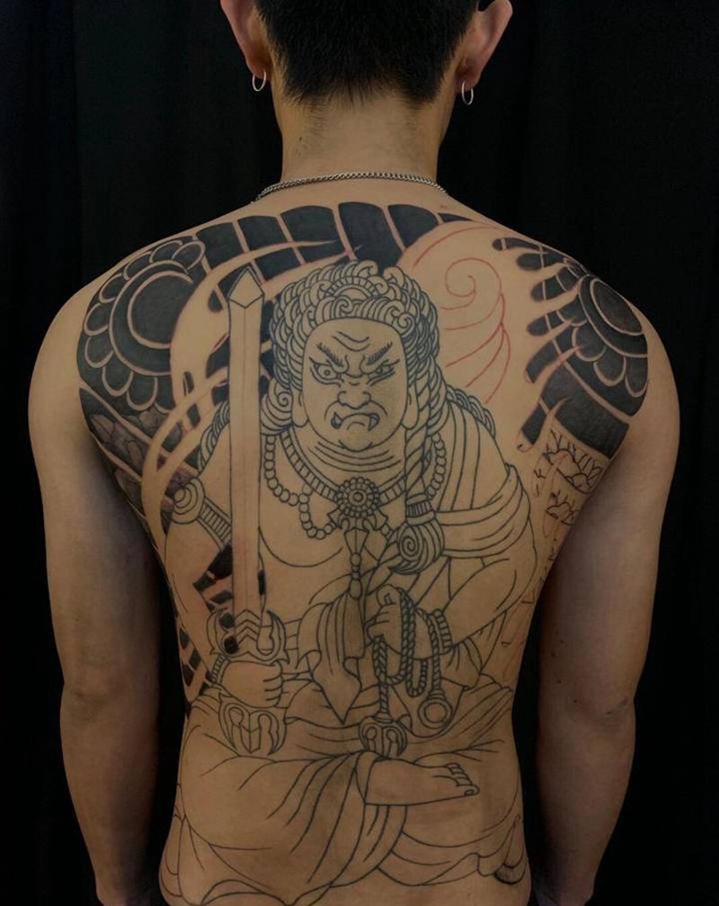 满背不动明王，未完待续纹身图片_背部老传统纹身图案