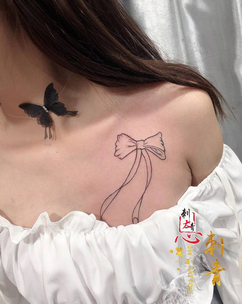 蝴蝶结纹身图片_胸部New School纹身图案