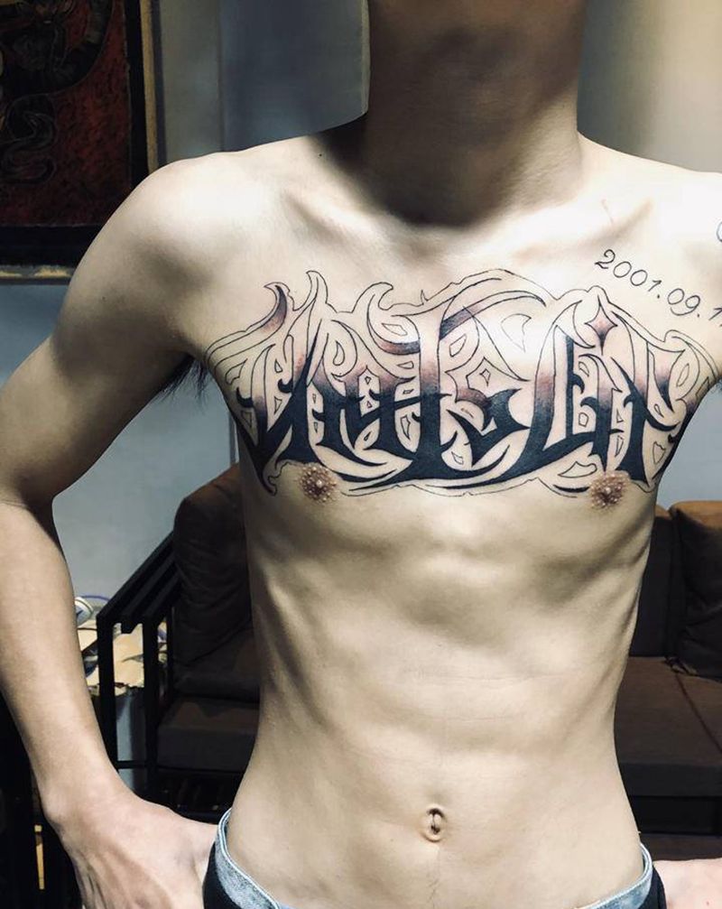 花胸纹身图片_胸部花体字纹身图案
