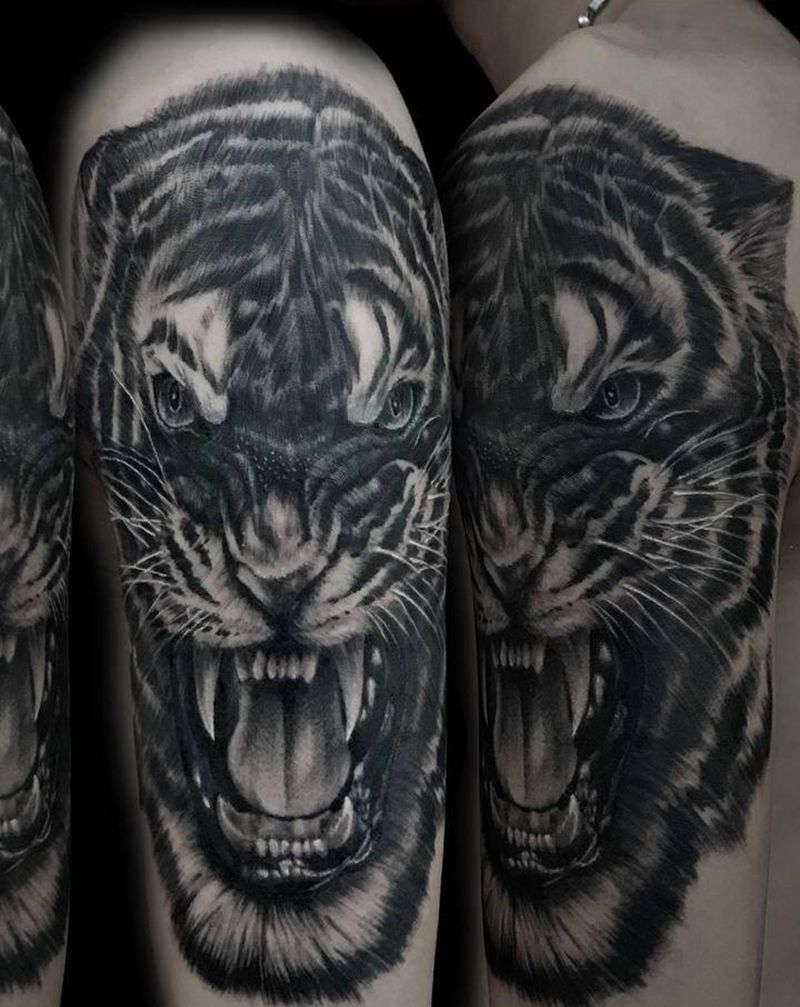 虎头遮盖图腾纹身图片_手臂欧美写实纹身图案