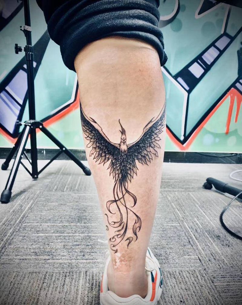 浴火重生纹身图片_腿部欧美写实纹身图案